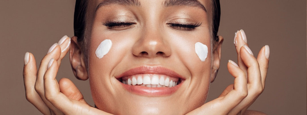 a woman with hydrating skincare products on her face