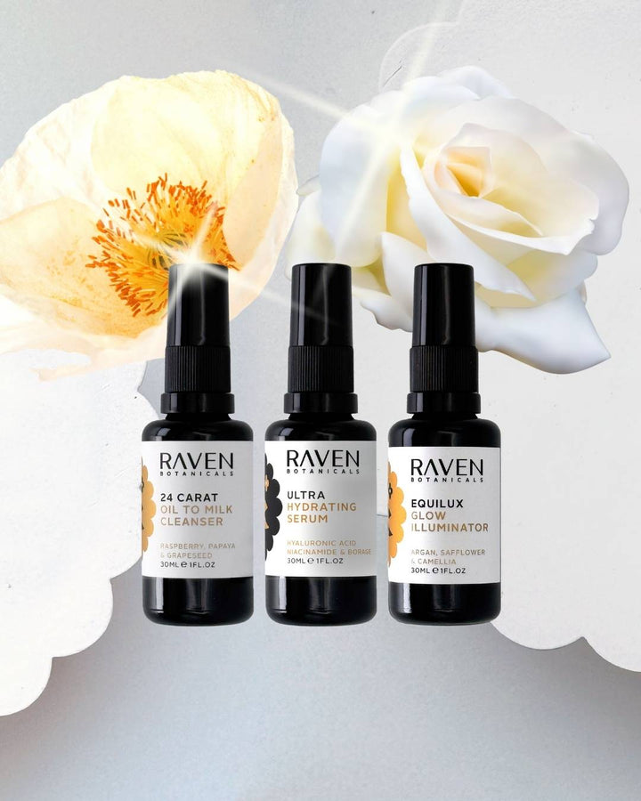 Raven Botanicals Scottish Skincare Summer Glow Set with a white poppy and a rose.